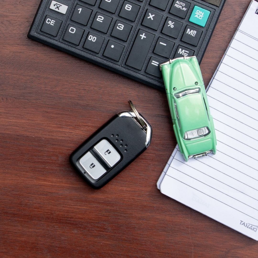 How to Handle Vehicles After a Death Car keys and V5C logbook showing vehicle ownership transfer after a death in the UK.