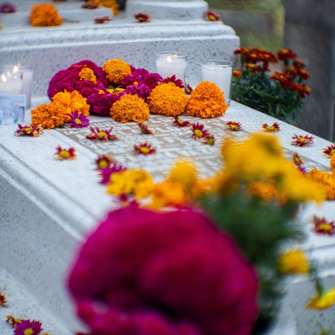 Celebrity Graves You Can Visit Visitors paying respects at famous graves in historic cemeteries highlighting cultural icons and memorial sites.